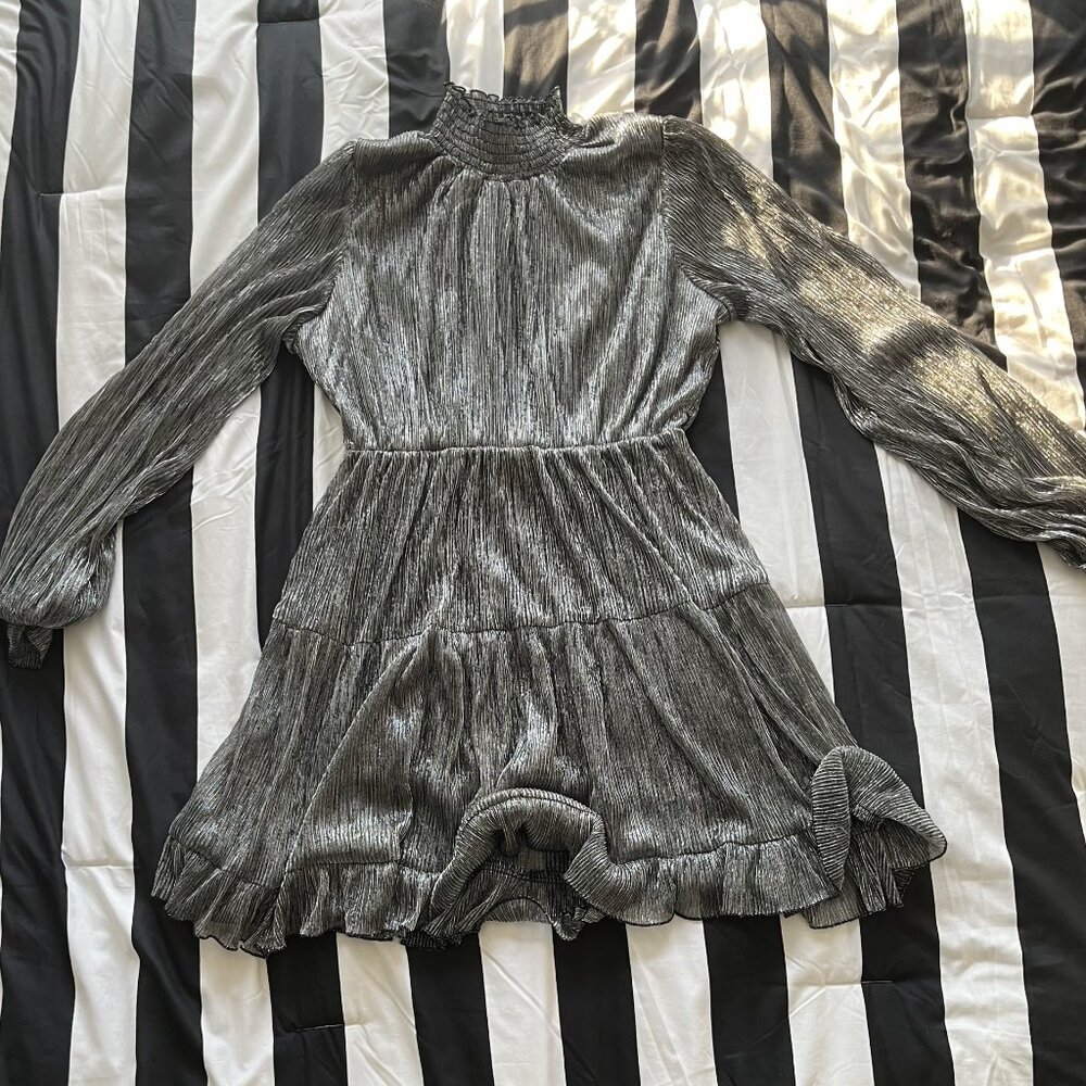 A bold and celebratory dress designed to make a statement by O.P.T.
